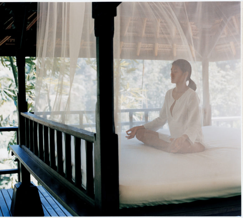 woman-bedroom-meditation-nature-main-building-rainforest-natural-healing-como-shambhala-bali-indonesia-asia