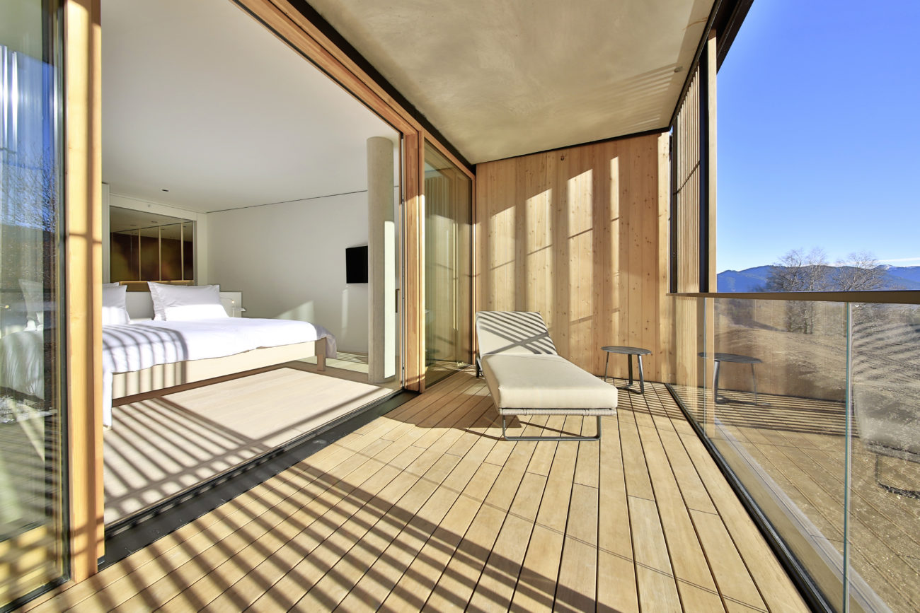modern-double-room-private-balcony-open-windows-panorama-view-lanserhof-tegernsee-germany