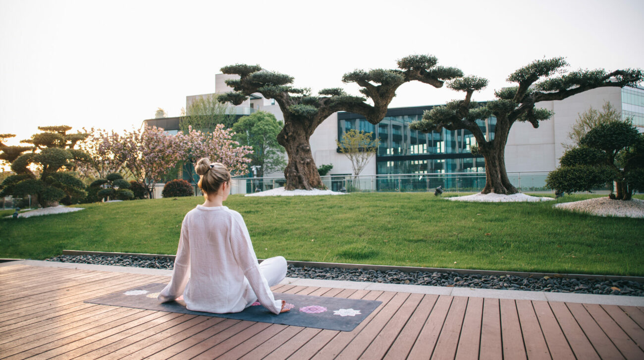 woman-meditating-outdoor-anandi-hotel-shanghai-healing