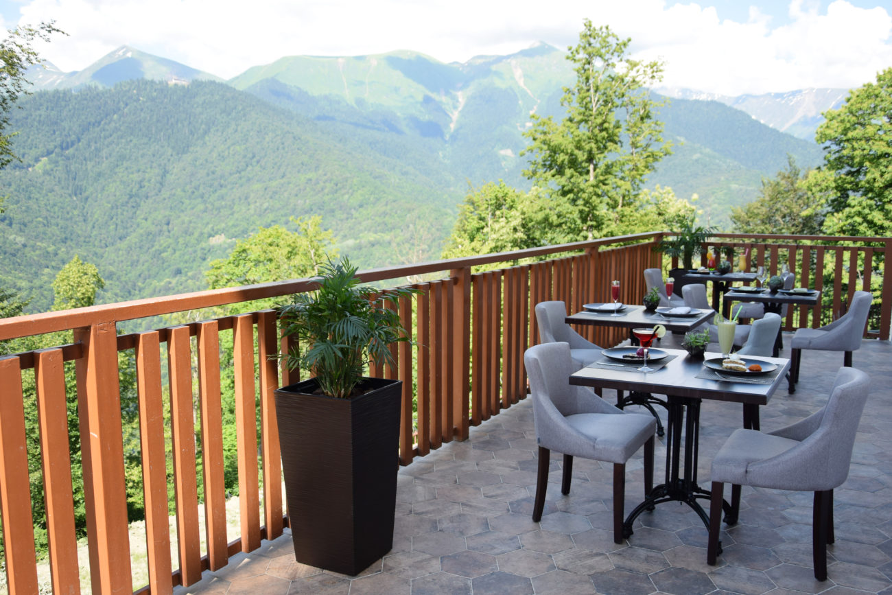 outside-terrace-balcony-lunch-healthy-air-mountains-green-flow-hotel-russia
